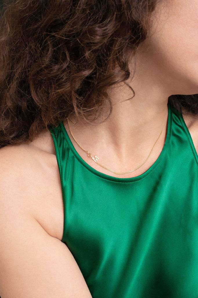 JUKSEREI LETTER NECKLACE Osterangebot