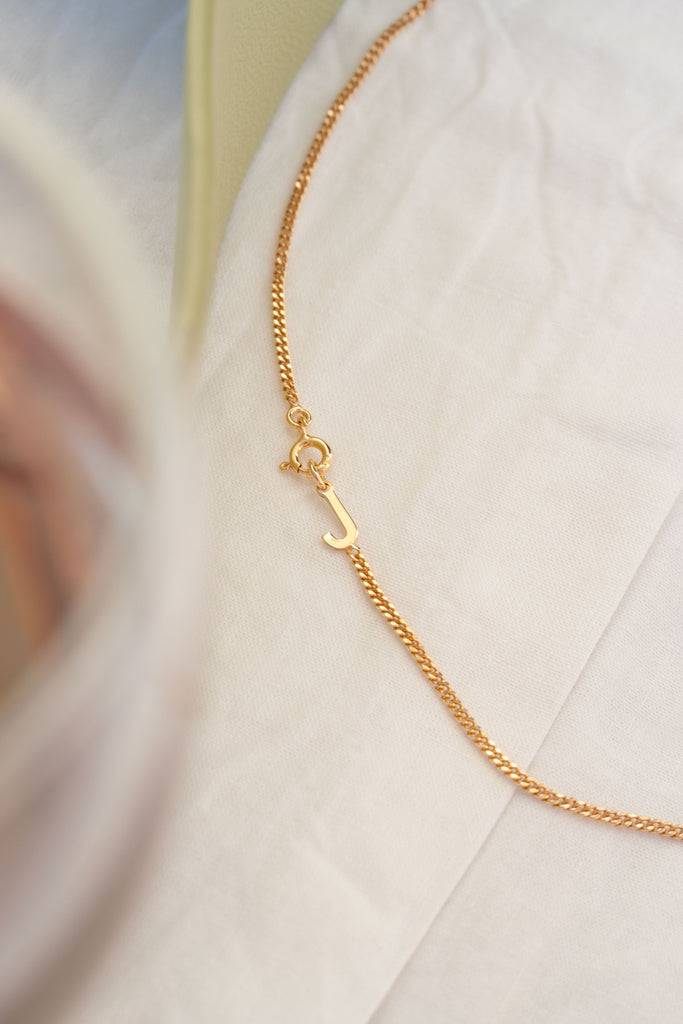 JUKSEREI LETTER NECKLACE Osterangebot