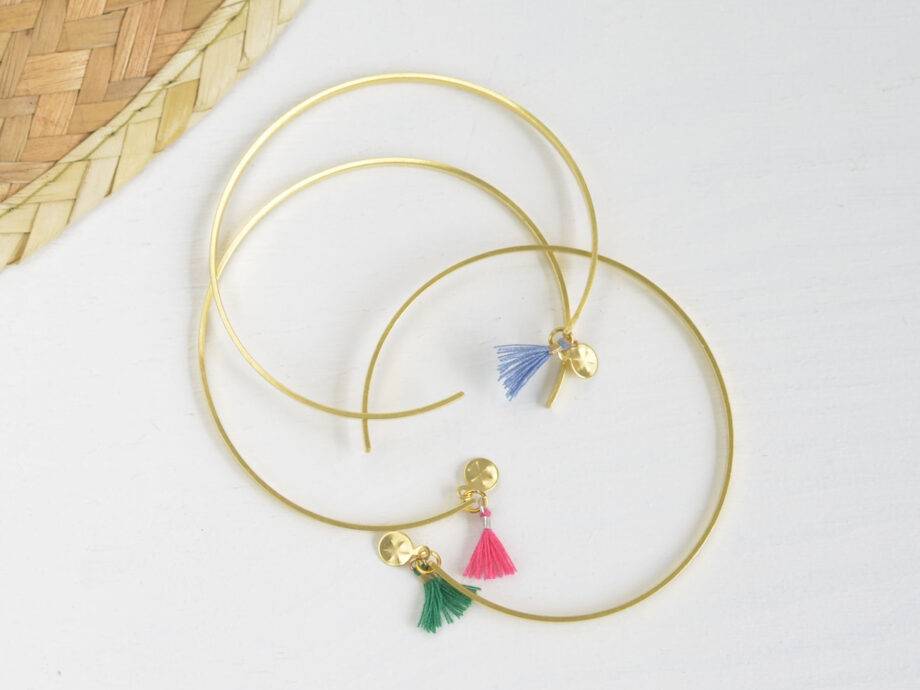 Renna Deluxe Armreif in Gold, Goldarmreif mit niedlicher Tassel im Boho-Stil Lagerräumung